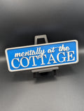 Blue Mentally at the Cottage Street Sign