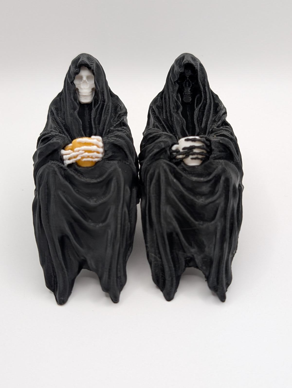 Sitting Reaper with Teacup