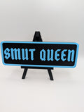 Light Blue Smut Queen Street Sign